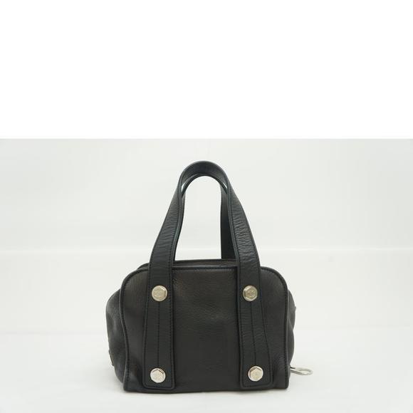 Chanel Handbags - Chanel Mini Hand Leather